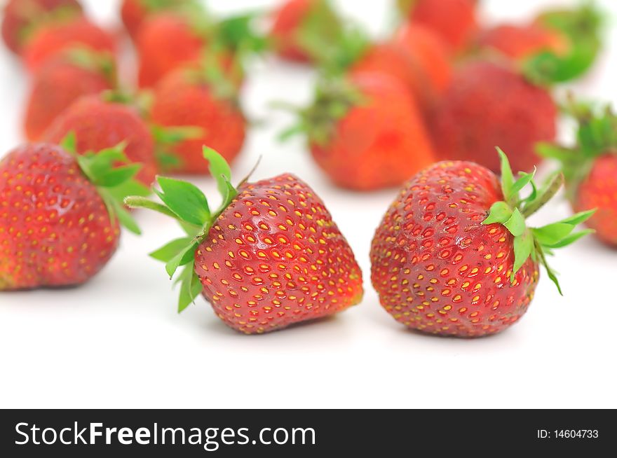 Fresh ripe red strawberries, isolated on white with soft shadow