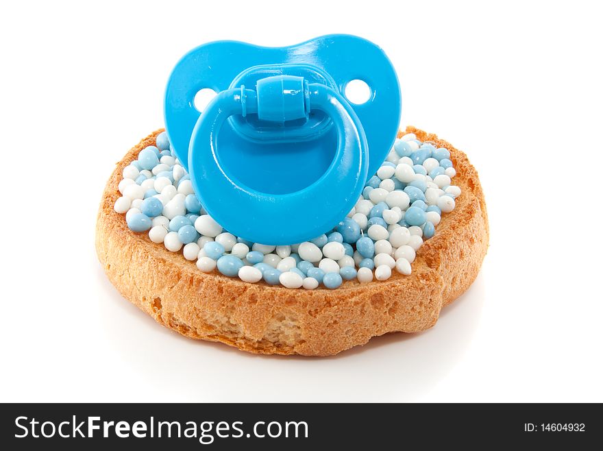 A biscuit with mice with a blue baby's comforter on top isolated over white