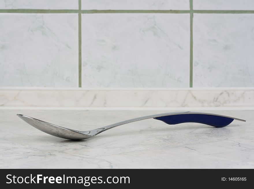 Kitchen tool on background of a marble