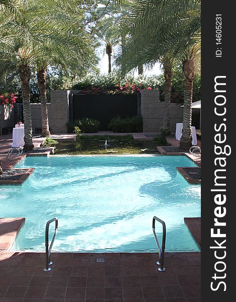 Resort pool with lounge chairs in Arizona. Resort pool with lounge chairs in Arizona