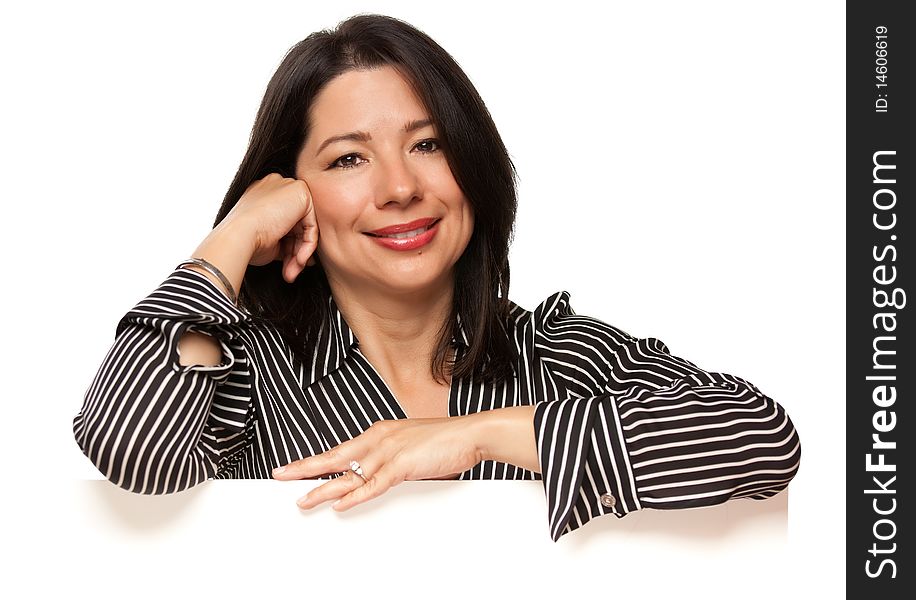 Attractive Multiethnic Woman Leaning on Blank White Sign Corner Isolated on a White Background.