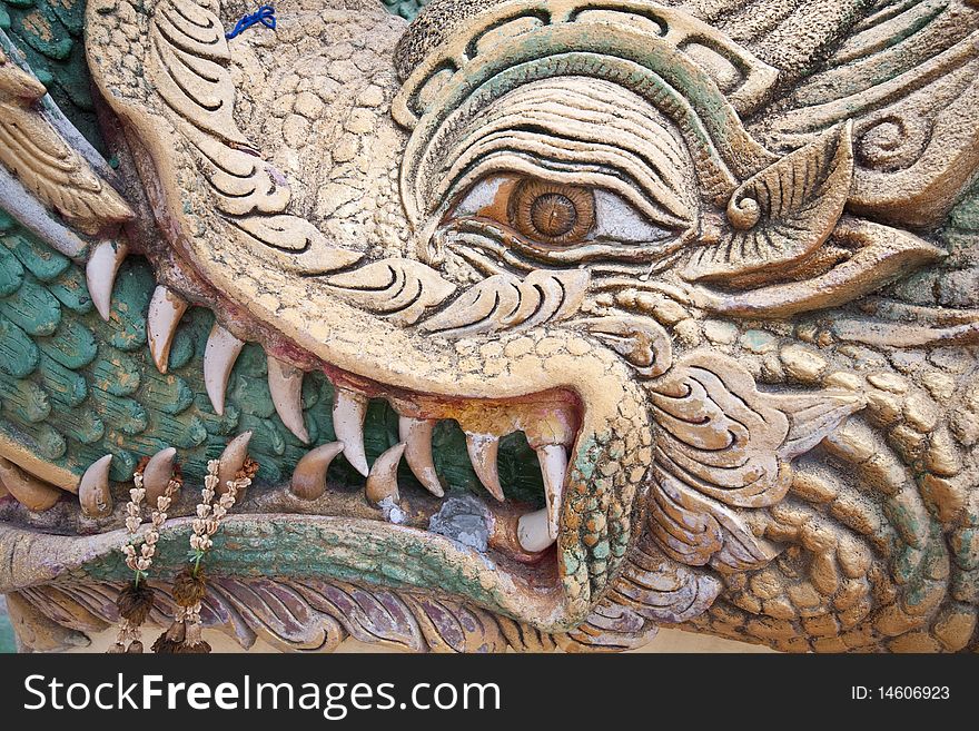 Dragon face carved