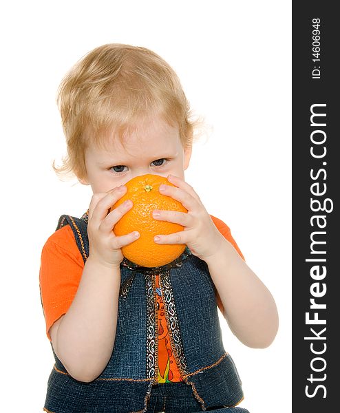 Girl with orange is insulated on white background. Girl with orange is insulated on white background