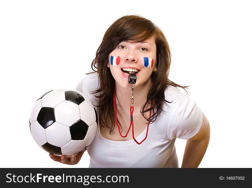 Young female french team fan with football ball and whistle, also small flags painted on her cheeks, studio shoot isolated on white background. Young female french team fan with football ball and whistle, also small flags painted on her cheeks, studio shoot isolated on white background