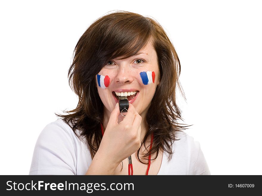 Young female french team fan, with whistle and small flags on her cheeks, studio shoot isolated on white. Young female french team fan, with whistle and small flags on her cheeks, studio shoot isolated on white