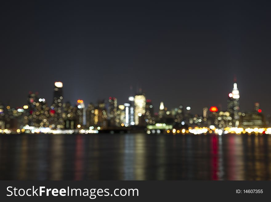 An artistic blur of the Empire State Building and mid town Manhattan in New York City. An artistic blur of the Empire State Building and mid town Manhattan in New York City