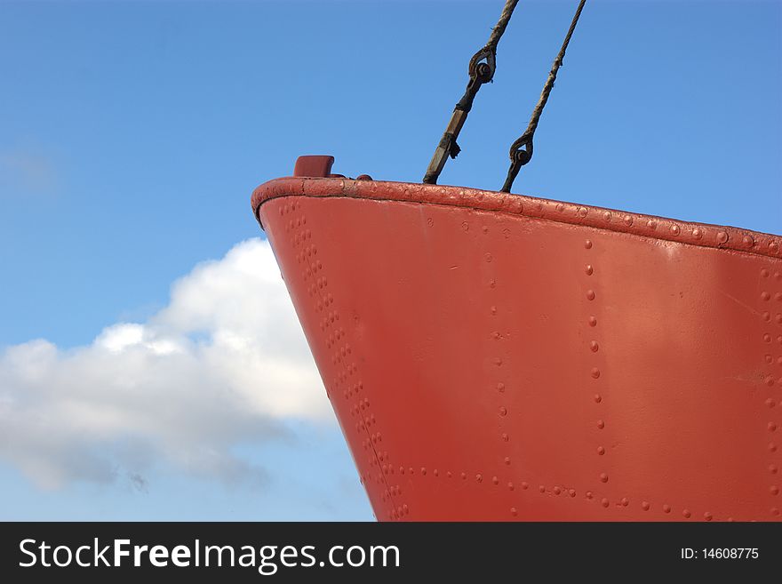 Red Boat And Blue Sky