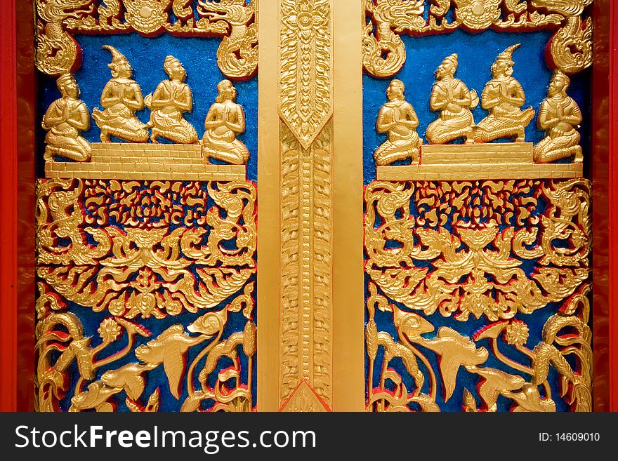 Thai painting on a door at buddhist church of Rayong Thailand