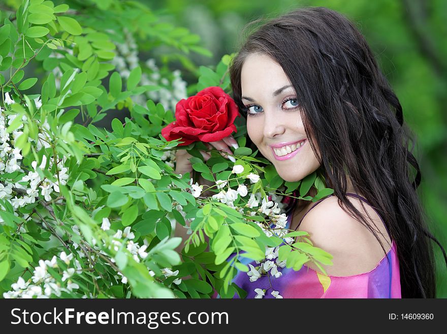 Beautiful young teenage girl in garden