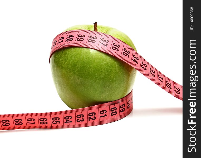 Green Apple And Measuring Ribbon For Diet