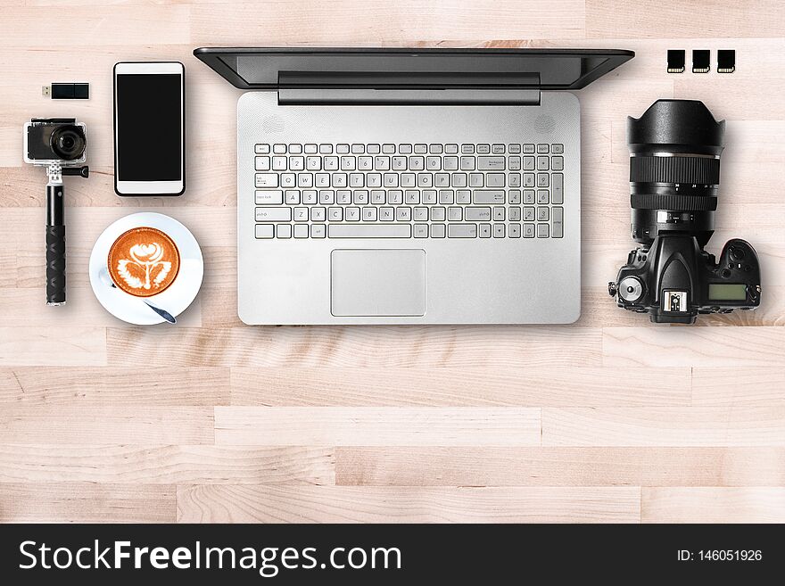 Professional Photographer working desk with dslr camera and photograph equipment , Freelance business workplace concept