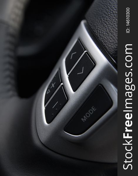 Buttons integrated on steering wheel for safety drive. Buttons integrated on steering wheel for safety drive