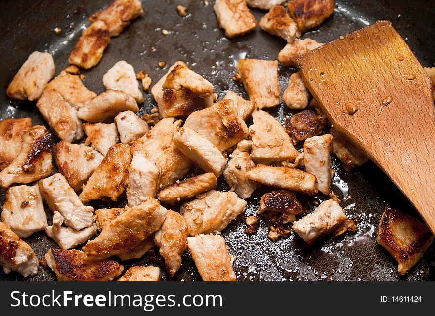 Fried meat processed for a goulash recipe. Fried meat processed for a goulash recipe
