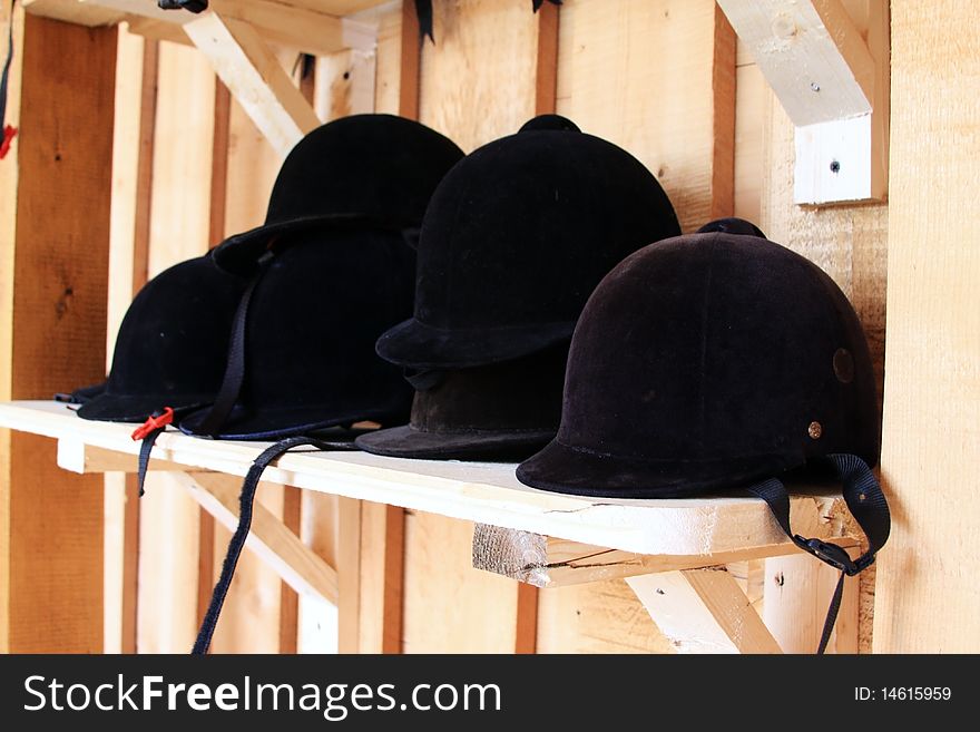 A collection of jockey hats used for competitions with horses!