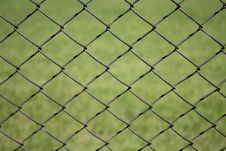 Metal Grid On A Green Background Stock Images Metal Grid On A Green Background Stock Images