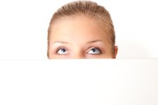 Woman Peeping From Behind White Board Royalty Free Stock Photo