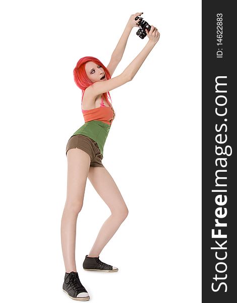 Red-hair girl with photocamera