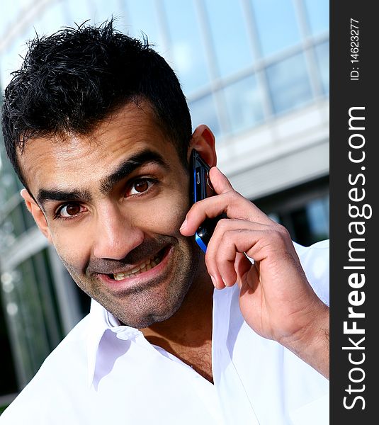 Young and attractive businessman with smile. Young and attractive businessman with smile