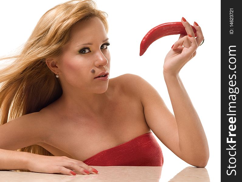 The seductive woman with a red pepper