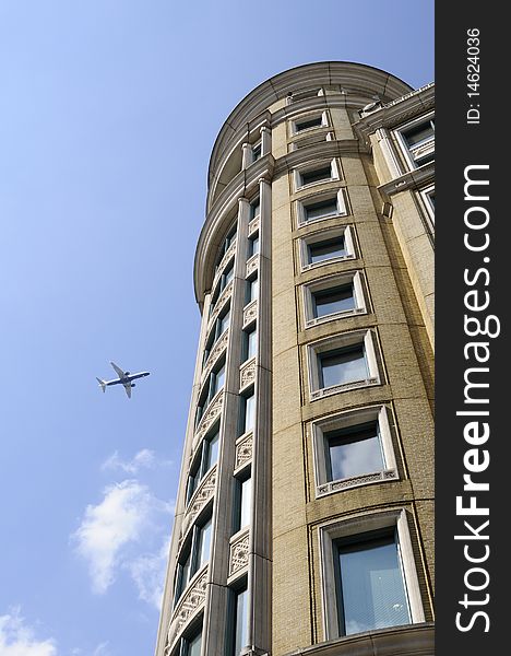 Airplane And Vertical Building