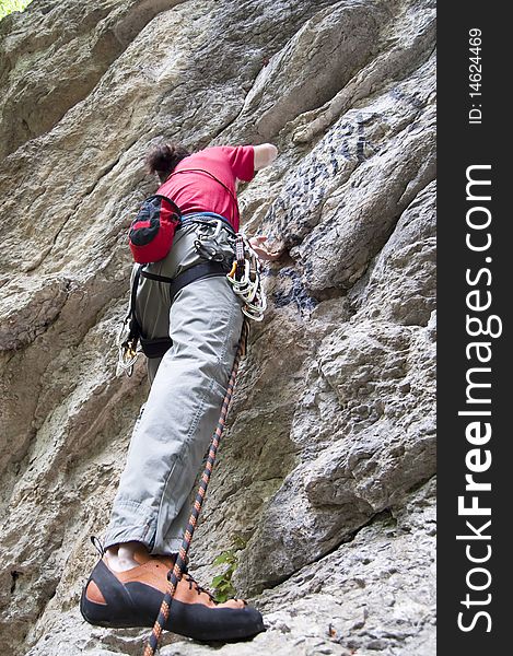 Rock climber on a difficult route