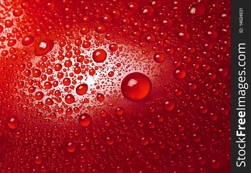Water drops on abstract red surface. Water drops on abstract red surface.