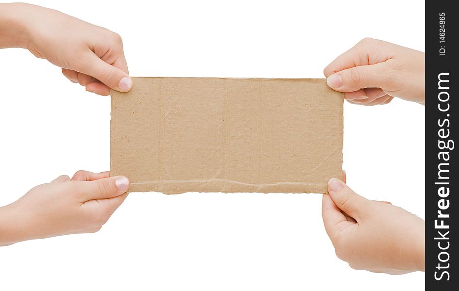 The cardboard tablet in a hand isolated over white