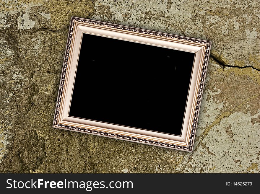 Empty frame on rusty cracked concrete background