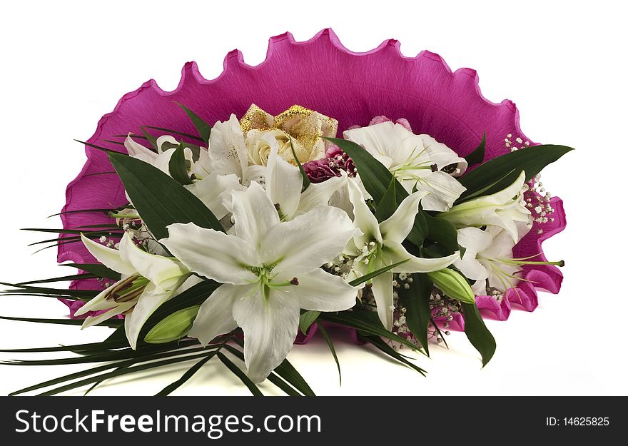 Bunch of flowers lilyes one rose wraped in purple isolated on white