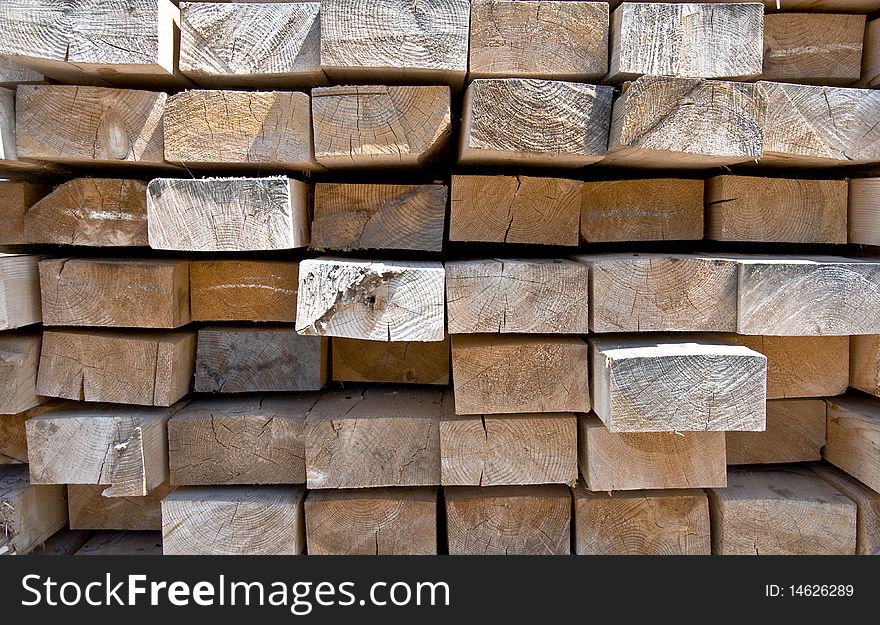 The texture of wooden bars placed on each other. Frontal. Close-up. Clipart.