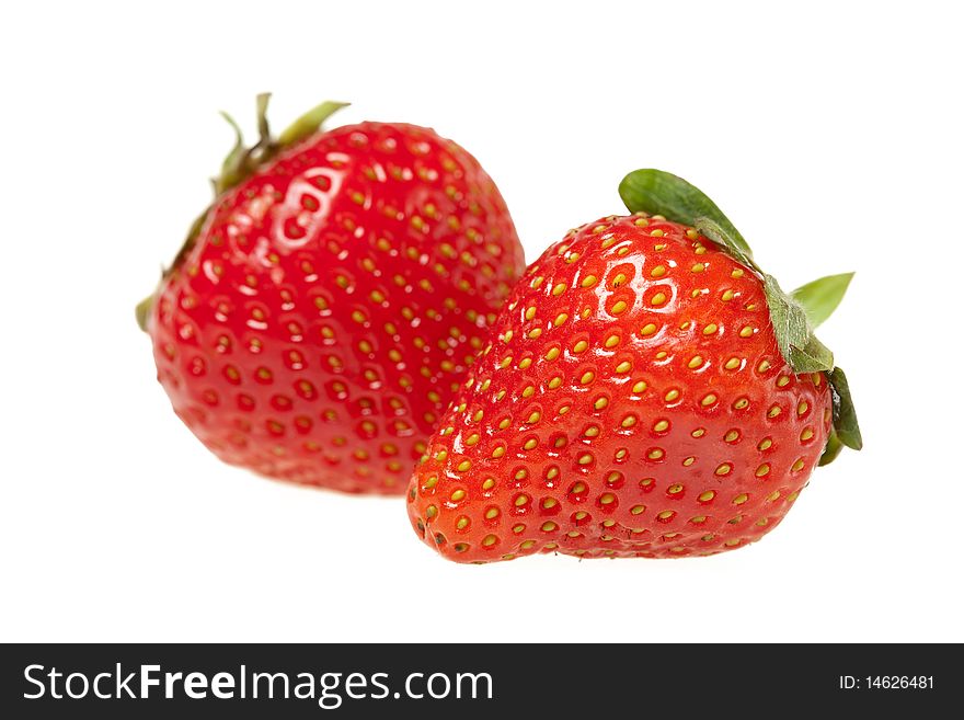 Two berries of the strawberries on white background