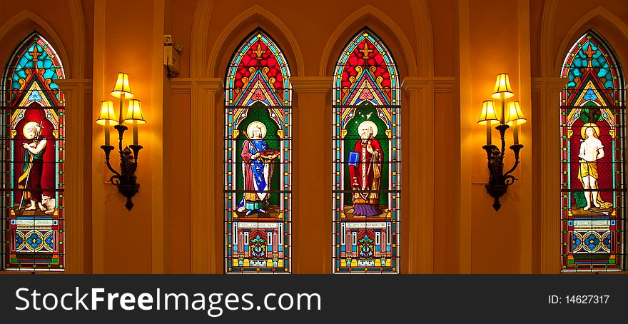 Old style painted glass in gothic church, east of Thailand. Old style painted glass in gothic church, east of Thailand