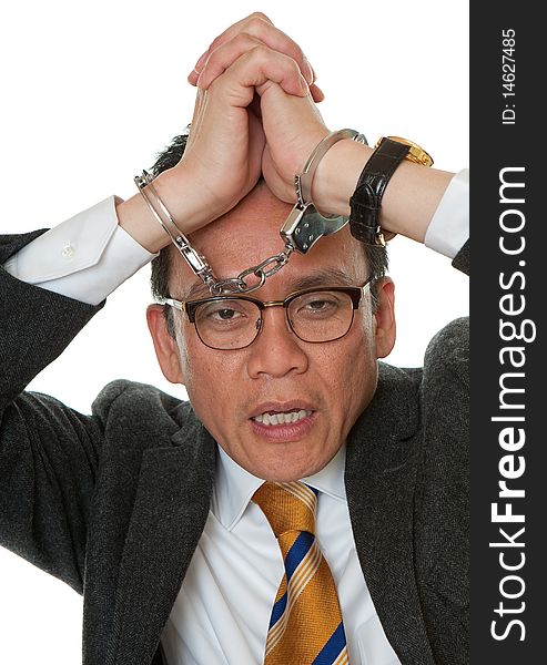 Businessman with handcuffs, because of corruption or deception arrests