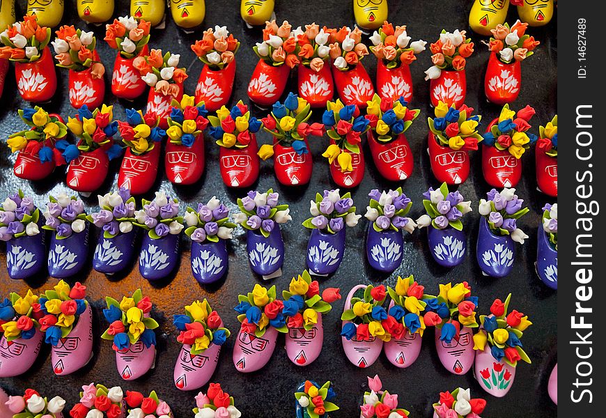 Holland souvenirs, miniature wooden shoes filled with flowers.