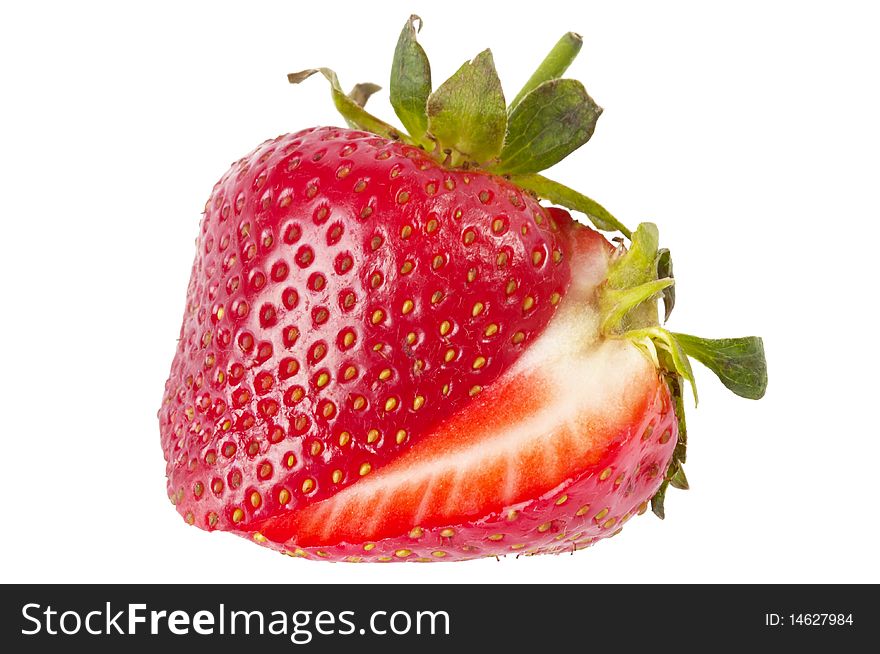 Sliced strawberry macro shot isolated over white background