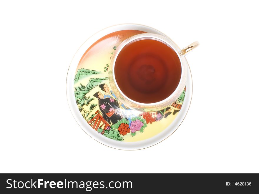Isolated cup of black chinese tea with art illustration on hystorical themes. Isolated cup of black chinese tea with art illustration on hystorical themes.