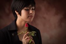 Multiethnic Young Adult Woman Portrait With Rose Stock Photo