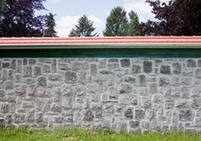 Stone Wall With Red Roof Stock Photo Stone Wall With Red Roof Stock Photo