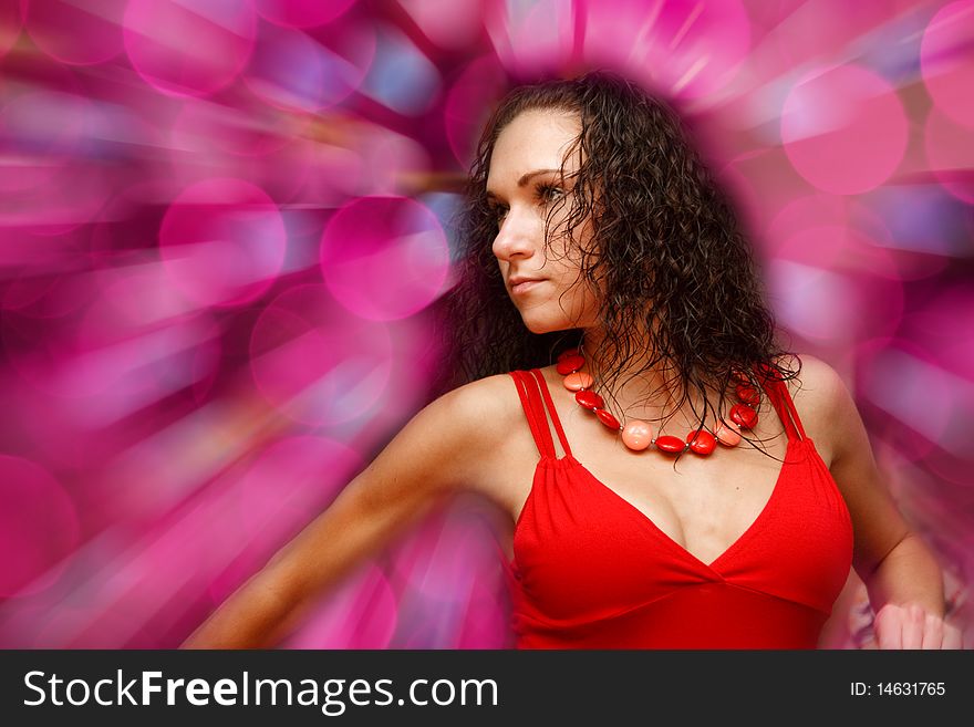 Beautiful dancing girl on blur background