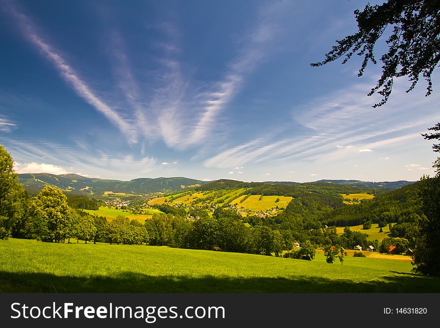 Scenery with hill and blue sky with impressive clouds. Scenery with hill and blue sky with impressive clouds