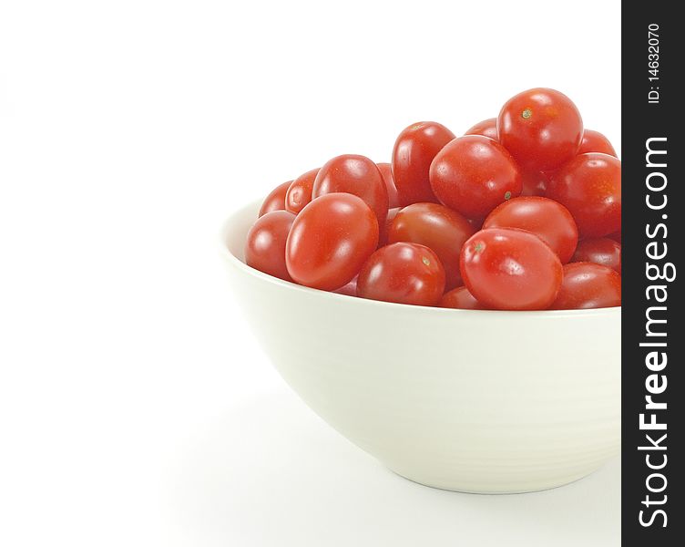 Bowl of italian ripe cherry tomatoes on white background. Bowl of italian ripe cherry tomatoes on white background