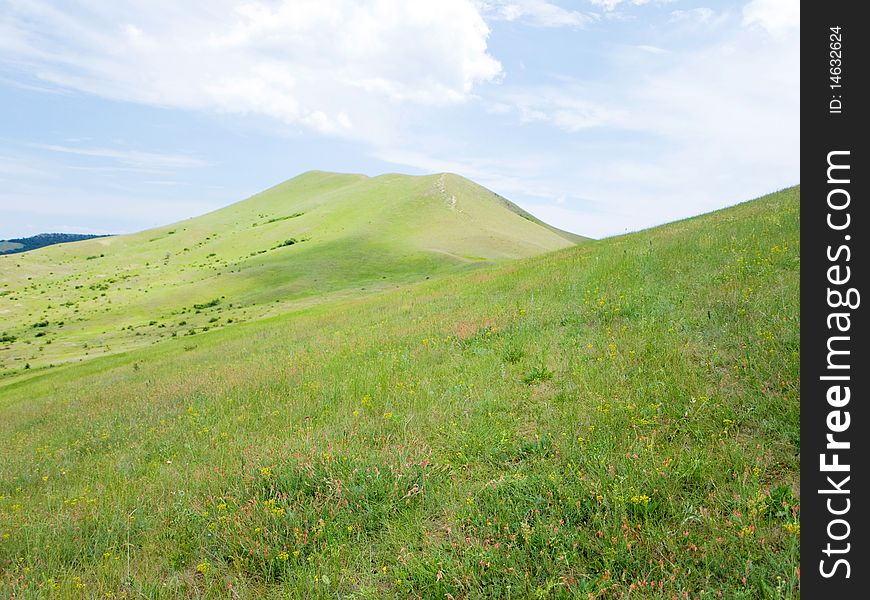 Background of cloudy sky and mountain landscape