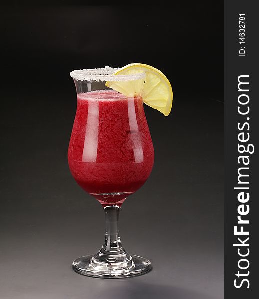 Tasty alcohol cocktail with lemon