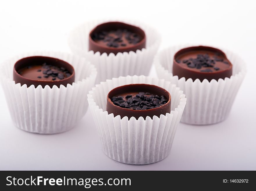 Chocolate candies in paper cups