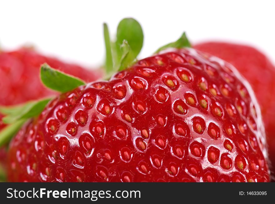 Ripe strawberry on a white background