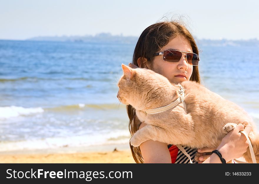 Teen girl with cat outdoor