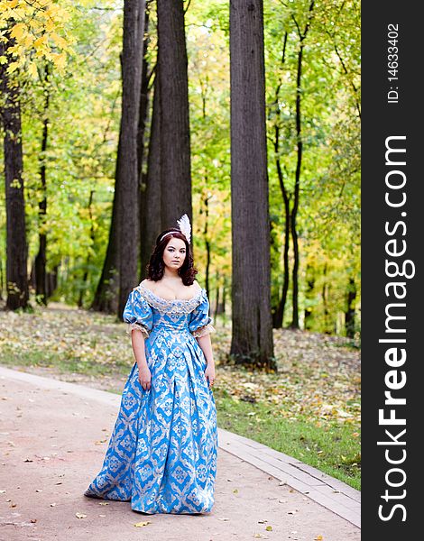 A portrait of lady in blue baroque dress