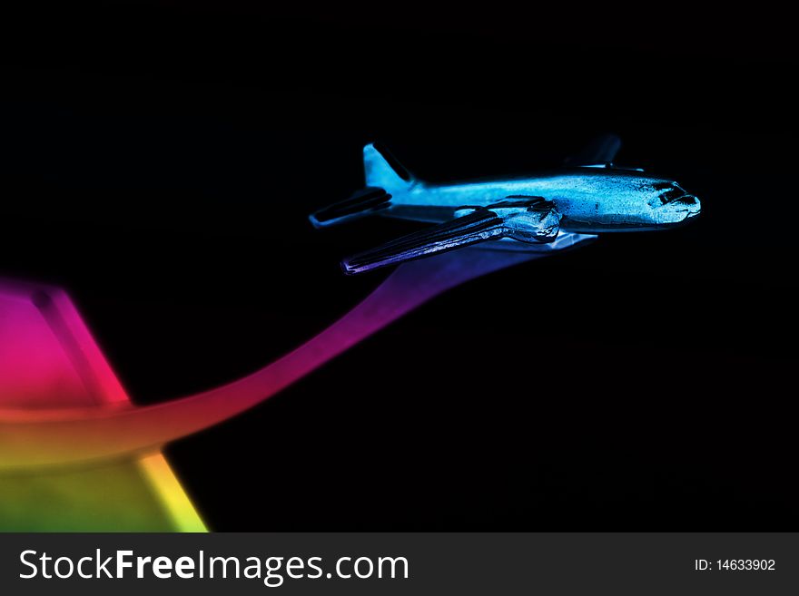 Colorful small metallic airplane isolated