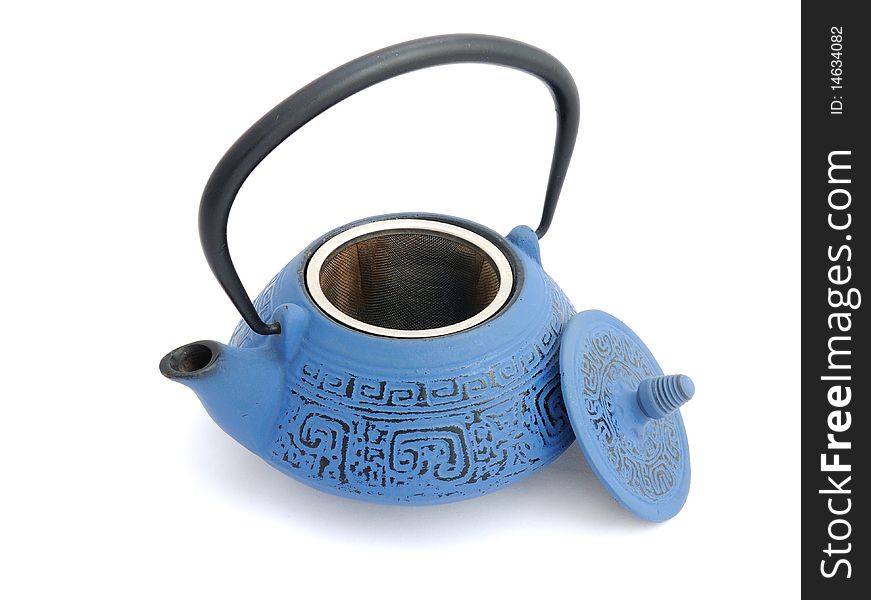 Blue iron teapot with a cap opened and tea strainer. Blue iron teapot with a cap opened and tea strainer