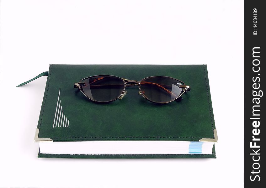 Glasses and notebook